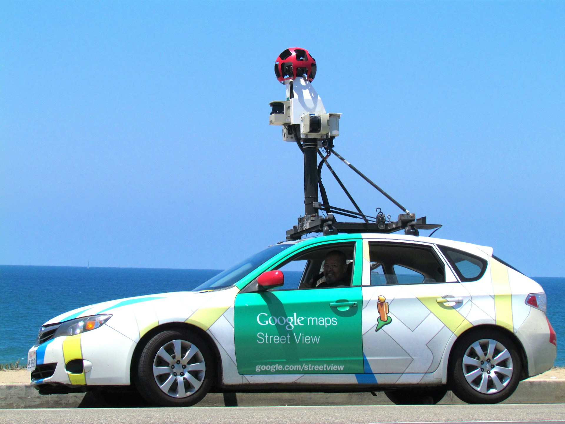 A gym owner checking Google Maps on a phone to see if their business appears in local search